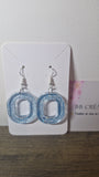Boucle d'oreille style B